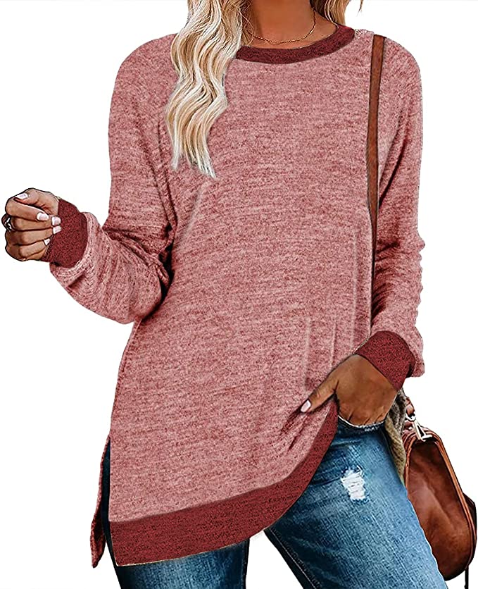 A cozy tunic top for moms that is a muted color with the cuffs, hem and color being darker. Shown in red.