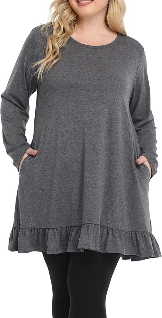 A solid gray tunic top for moms that has a ruffle hem line