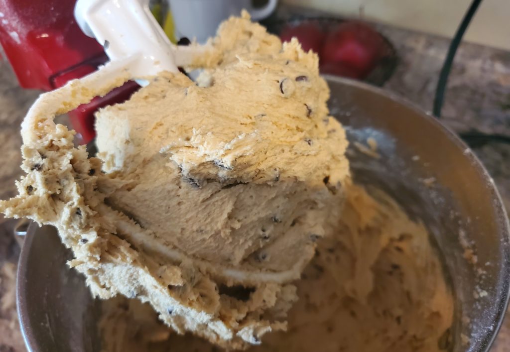The finished edible chocolate chip cookie dough in the stand mixer