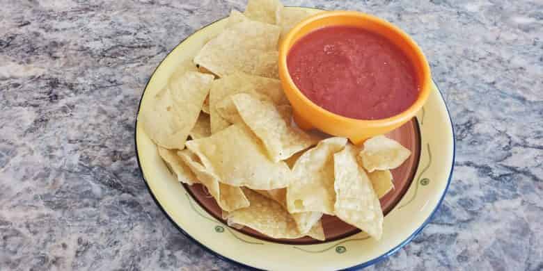 An easy, flavorful mild salsa recipe that can be made with ingredients from your pantry. It's a perfect addition to taco or nacho nights! #salsa #salsarecipe #easyrecipe