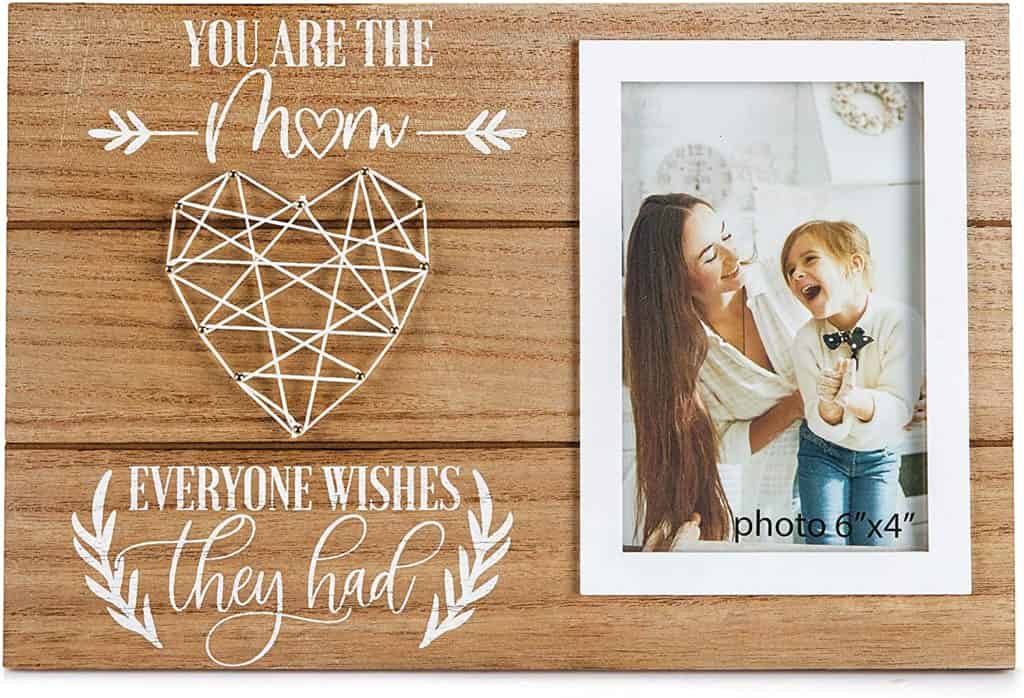 Wooden photo frame with string art that says, "You are the mom everyone wishes they had"