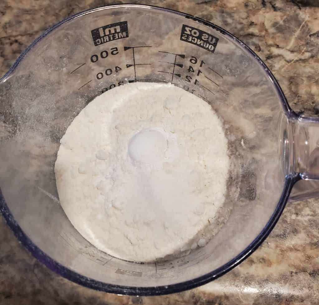 The flour, baking powder and salt in a large measuring cup