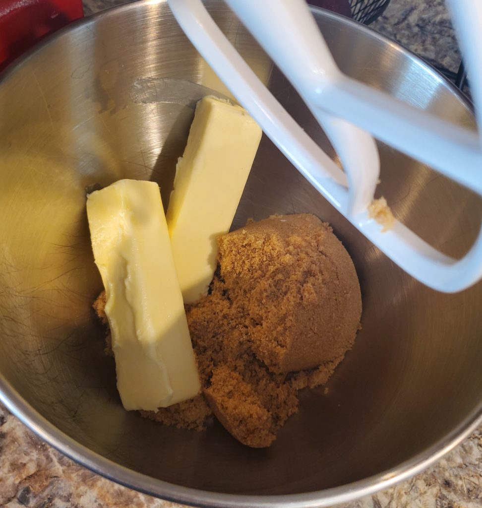 The butter and brown sugar in a mixing bowl ready to cream together for this edible chocolate chip cookie dough recipe