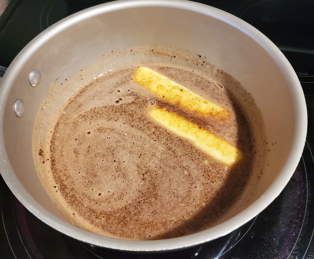 Part way through cooking the butter, cocoa powder and water in a medium saucepan of medium heat