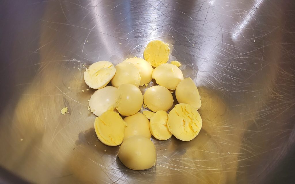 The egg yolks in a mixing bowl