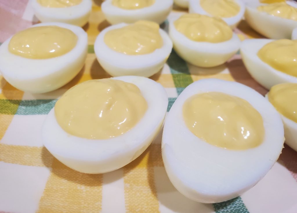 The completed deviled eggs ready to be served or refrigerated 