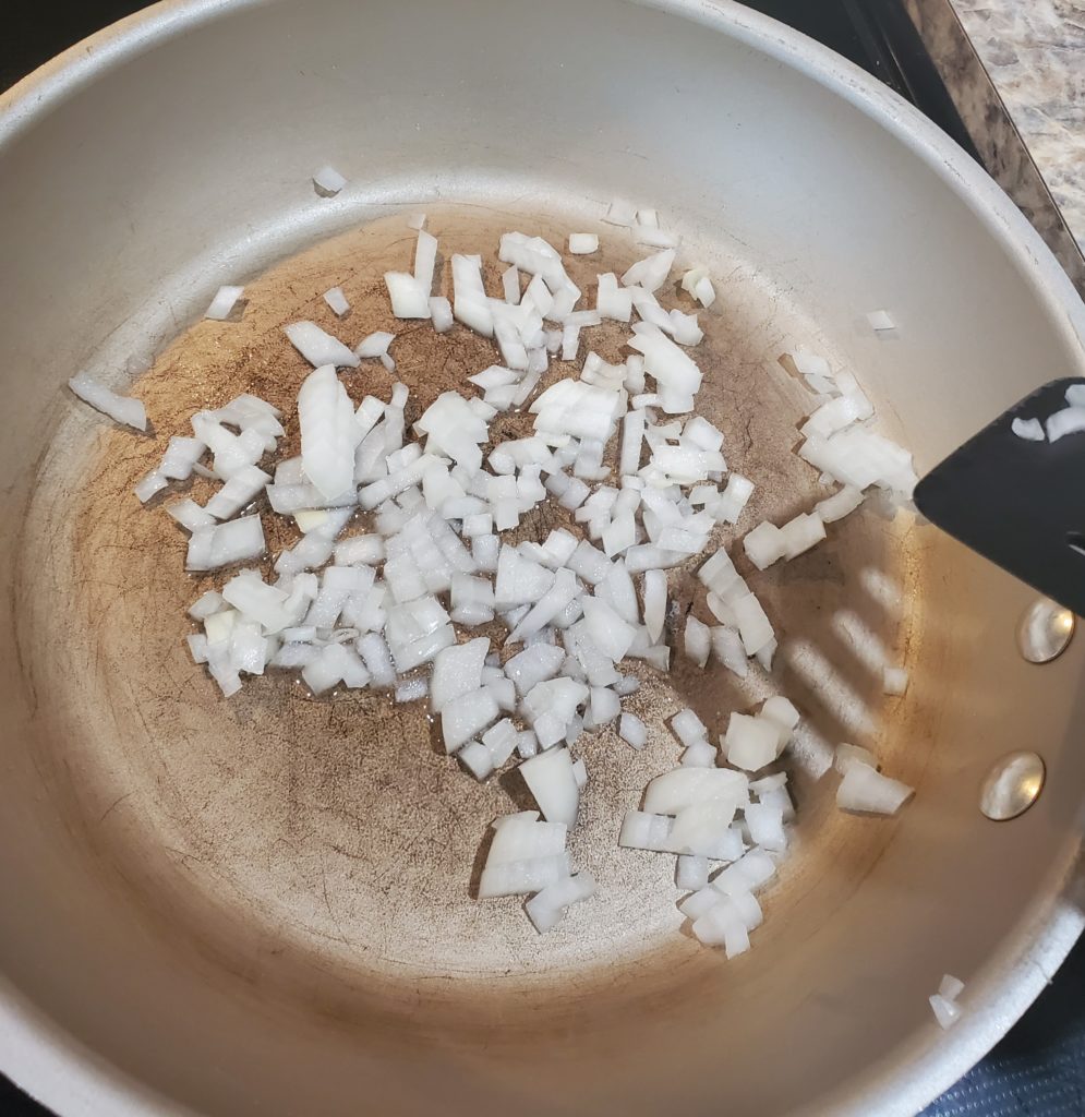 Onion cooking in a skillet
